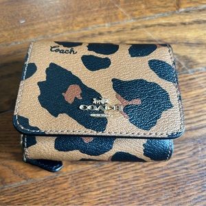 Coach cheetah trifold wallet